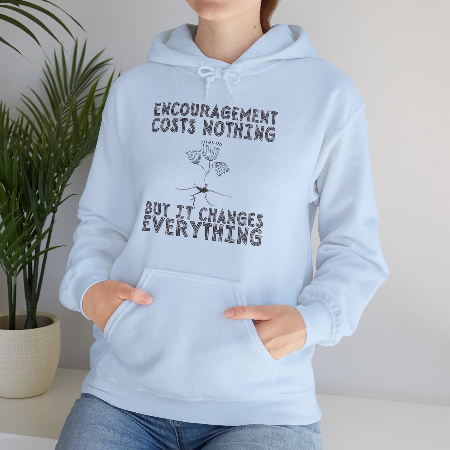 Encouragement Costs Nothing, But It Changes Everything Unisex Heavy Blend™ Hooded Sweatshirt